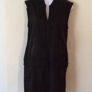 Black athletic dress. With pockets and zippers.